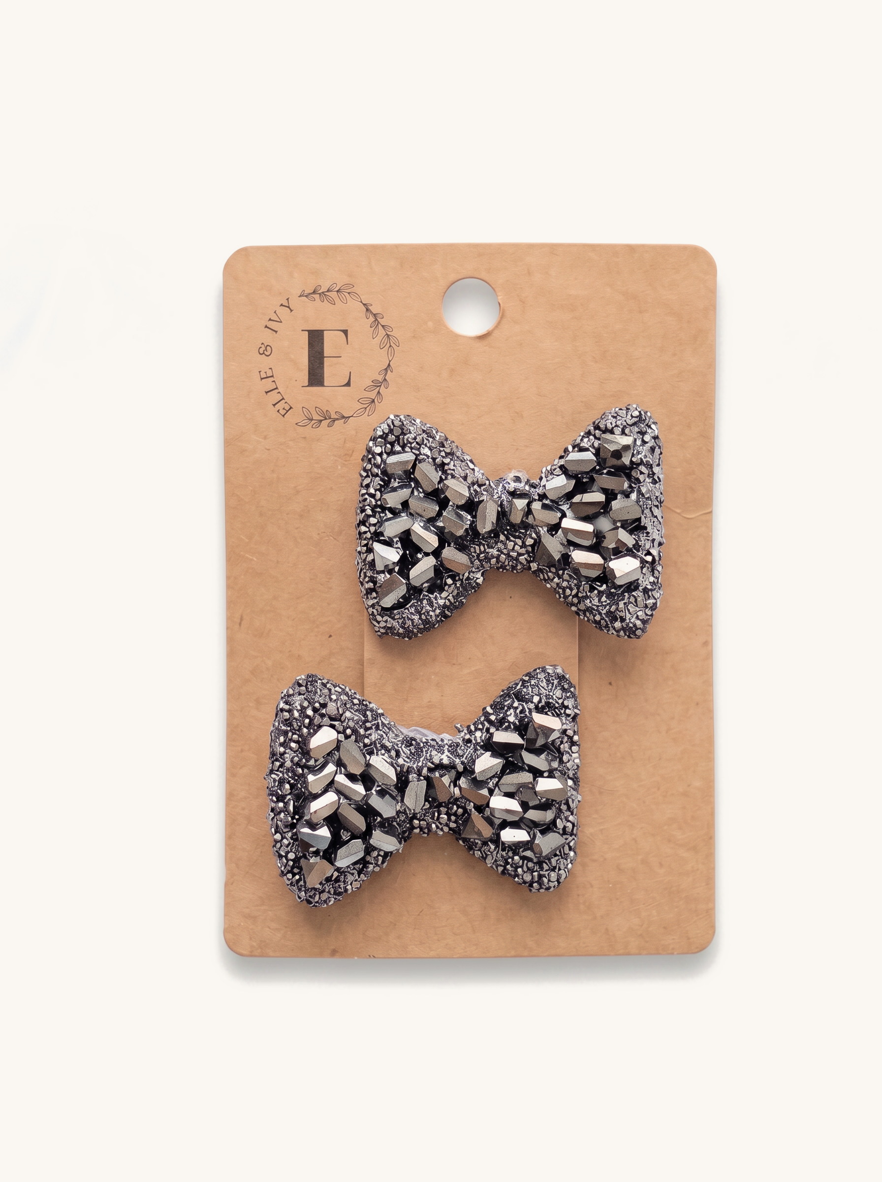 Gunmetal Crystal Bow Set — on the Elle & Ivy packaging card